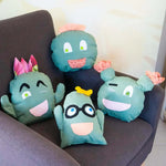 Coussins cactus à personnaliser sur un fauteuil, utilisant un patron de couture PDF à télécharger.
