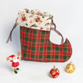 Pochette Botte de lutin de Noël décorée, idéale pour cadeaux et décorations de fêtes, avec patron de couture pdf à télécharger.