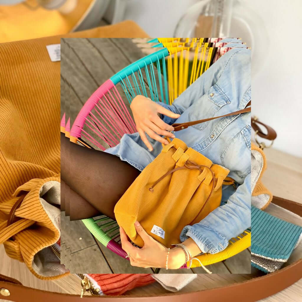 Personne portant un sac seau jaune, tutoriel sac seau disponible en patron de couture PDF à télécharger.