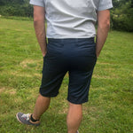 Bermuda Calcao, shorts tendance avec poches passepoilées, idéal pour un look décontracté ou habillé.
