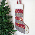 Calendrier de l'avent chaussette de Noël en tissu coloré avec rayures et poches, patron de couture pdf à télécharger