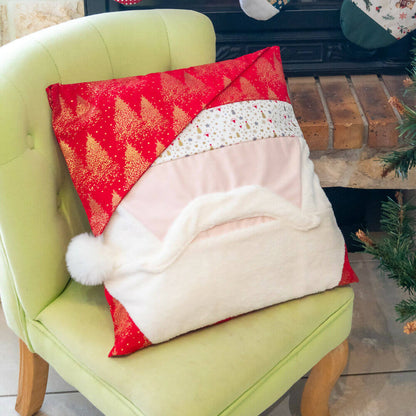 Housse de coussin design Père Noël, idéale pour ajouter une touche festive à votre décoration de Noël.