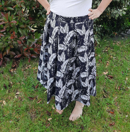 Jupe Hathor - T36 à 50, patron de couture pdf à télécharger avec plis années 60, poches italiennes et fermeture invisible sur le côté.