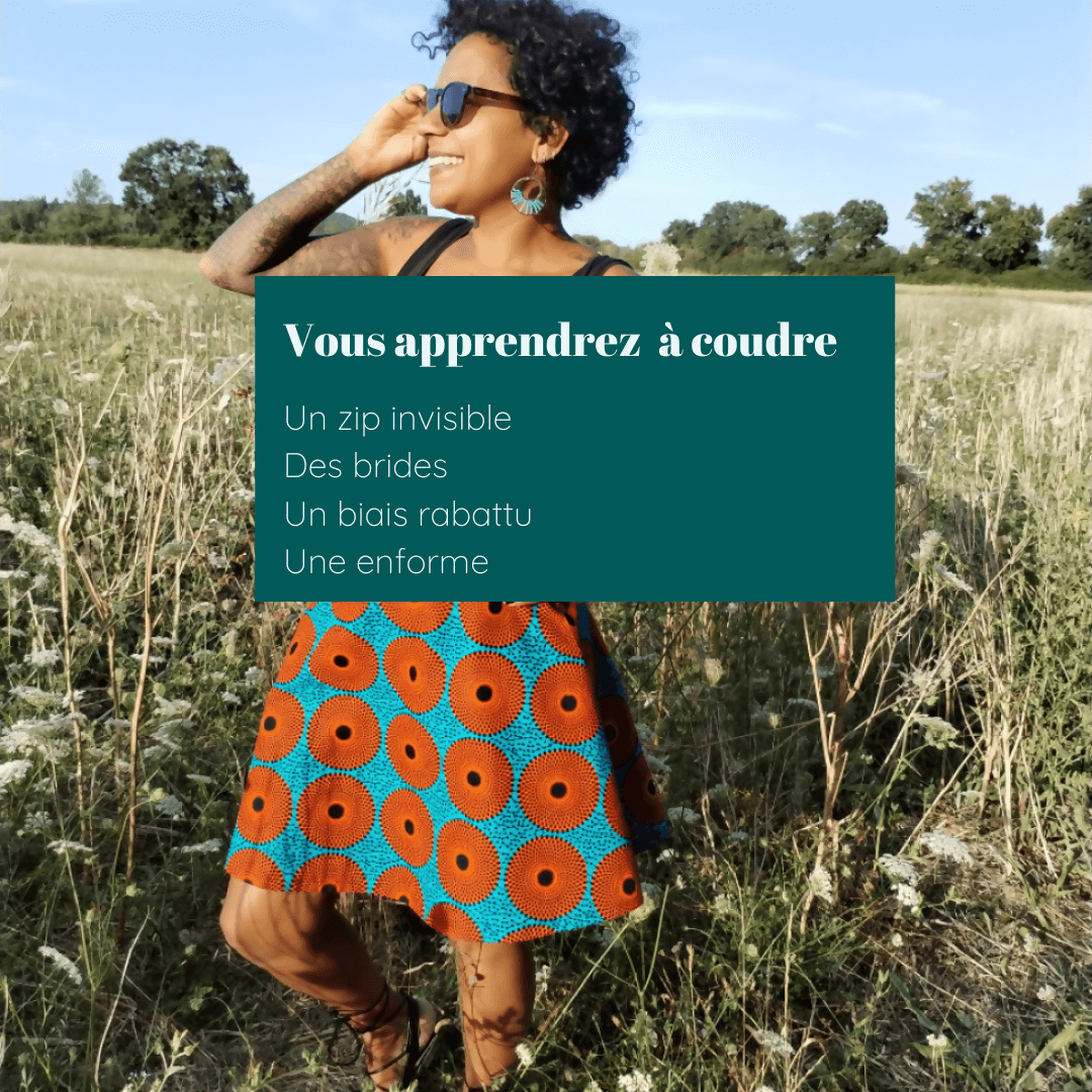 Femme portant la Jupe Ibaia (3 longueurs) | Taille 32 à 52, patron de couture pdf à télécharger, dans un champ, texte sur couture.