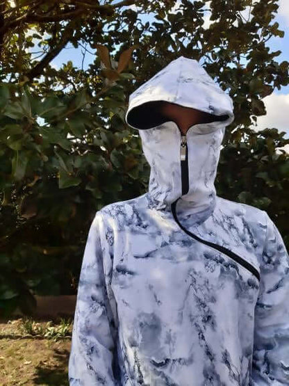 LE SWEAT ZIP ZAG 6- 16 ans affichant un design original en marbre avec capuche et zip diagonal.