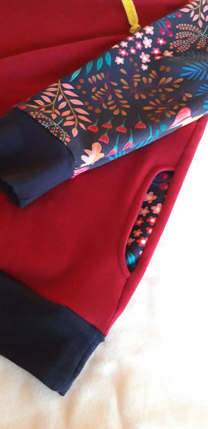 Détails du SWEAT FLEX adulte mixte du S au XL avec motifs floraux et poches élégantes.