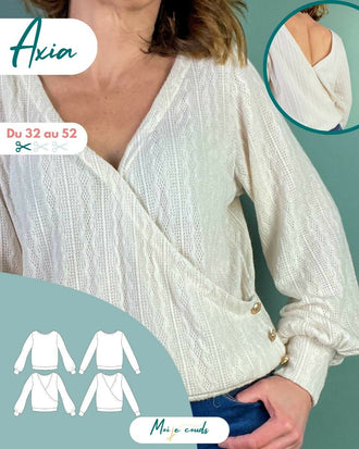 Le pull Axia du 32 au 52, patron de couture pdf à télécharger, élégant pull cache-cœur blanc, modèle réversible et polyvalent.