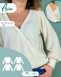 Le pull Axia du 32 au 52, patron de couture pdf à télécharger, élégant pull cache-cœur blanc, modèle réversible et polyvalent.
