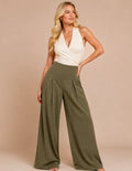 Patron PDF Pantalon femme LARA du 30 au 58, coupe large plissée en coton, porté avec top blanc