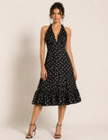 Patron PDF Robe SOLEA femme du 30 au 58, robe portefeuille à pois blanc sur fond noir, vue de face