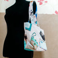 Petit Tote Bag avec Fond porté à l'épaule, coton écru et turquoise, motifs vintage