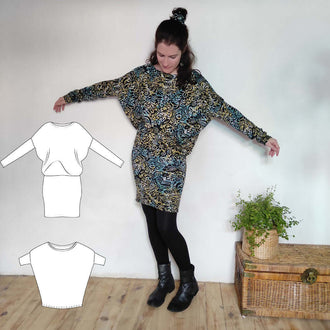 Femme portant la robe/top "Zanka" à encolure bateau, style ample avec jupe moulante, disponible du 32 au 56.