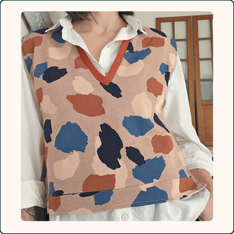 Patron de couture PDF à télécharger pour SWEAT SANS MANCHES MICHEL.E, modèle sans manches aux motifs abstraits colorés.