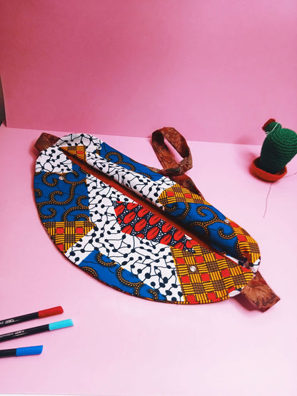 Sac Banane Kitrinos coloré, pratique et stylé, parfait pour un look tendance, avec des tissus variés à adapter à tous les styles.