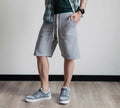 Short homme XS - XXL - WEEKEND, patron de couture PDF à télécharger. Modèle gris pour couture intermédiaire.