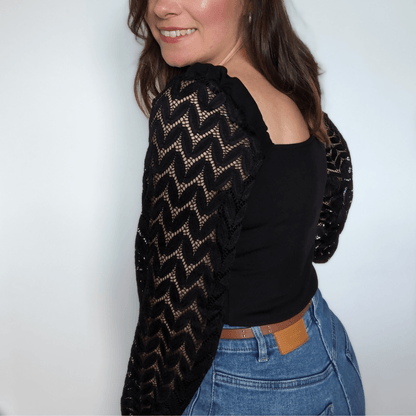 Top Touraco en maille noire avec manches à chevrons, coupe féminine et décolleté élégant, taille 32 à 52.