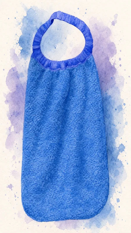 Grand bavoir enfant en tissu éponge à coudre soi-même, protection large pour les repas avec attache pression sur le côté — patron de couture PDF gratuit à télécharger